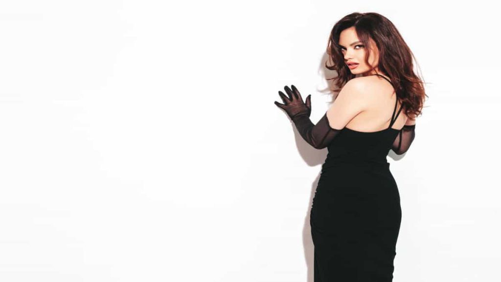 black dress with black gloves