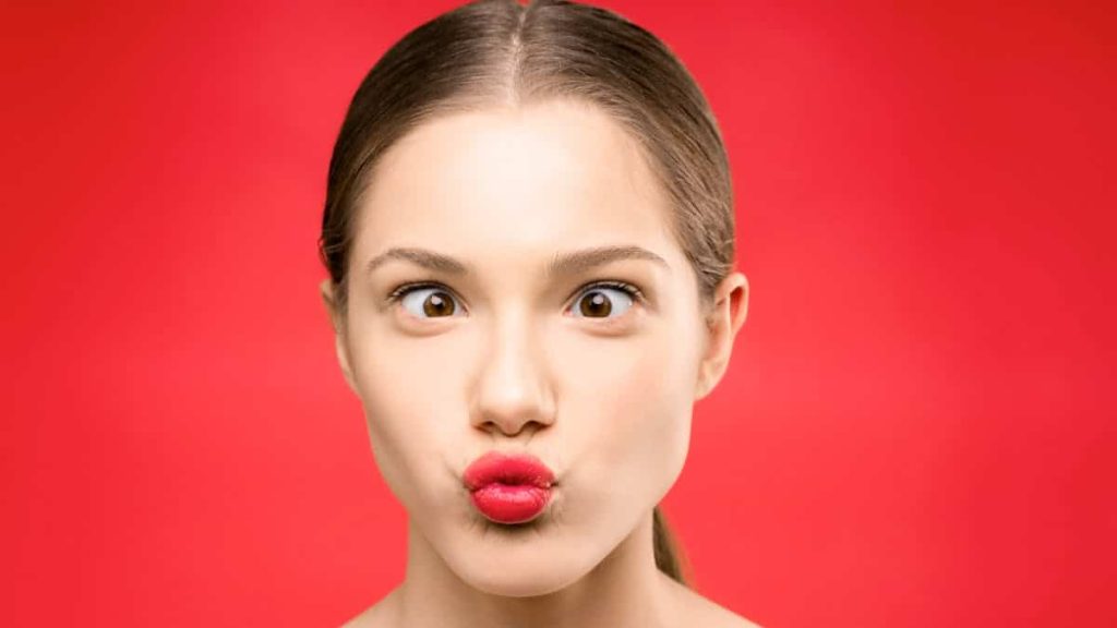 red lipstick with glitter