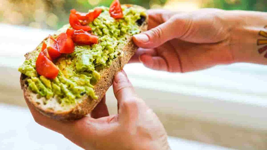 avacado with tomato healthy snack